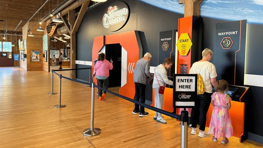Home Beyond Earth Exterior with Waypoints and Passport Cards at the Museum of Flight