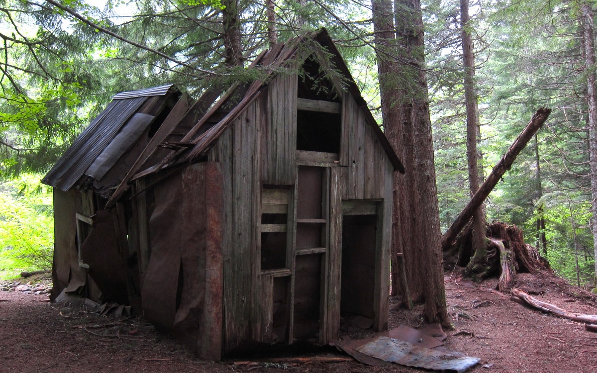 Ghost town hikes near Seattle include the Monte Cristo townsite and an abandoned cabin hikers can see along the trail