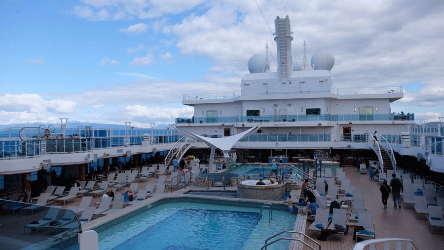 Alaskan cruise ship with a swimming pool on deck