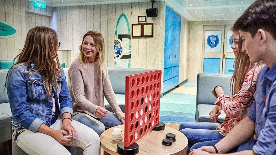 Kids playing a game in a kids club onboard a Princess cruise ship in Alaska