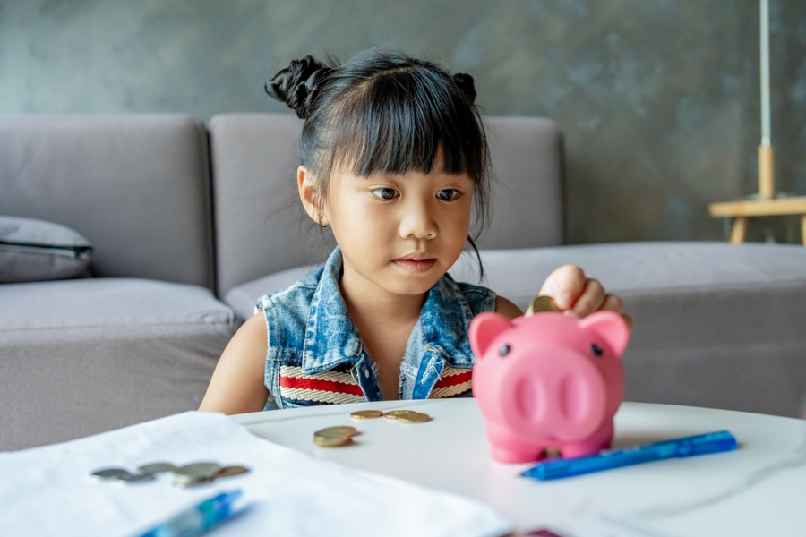 girl saving money for a special purchase