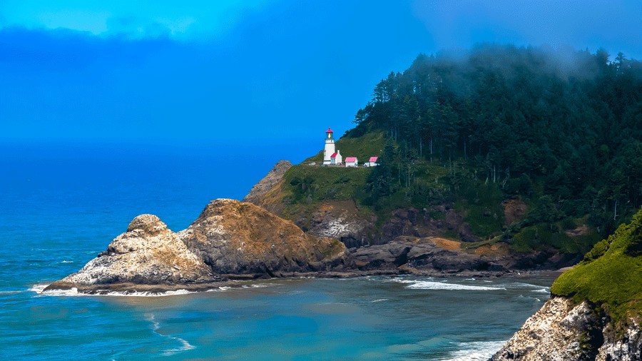 Heceta Head Lighthouse in Yachats Oregon sits high on a cliff