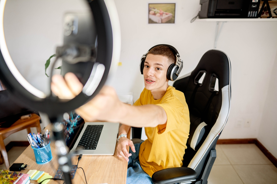 teen boy making a YouTube video