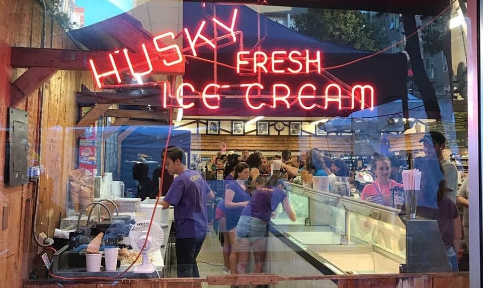 Seattle's Husky Deli ice cream counter seen through the window of the shop is a best ice cream in seattle pick for families