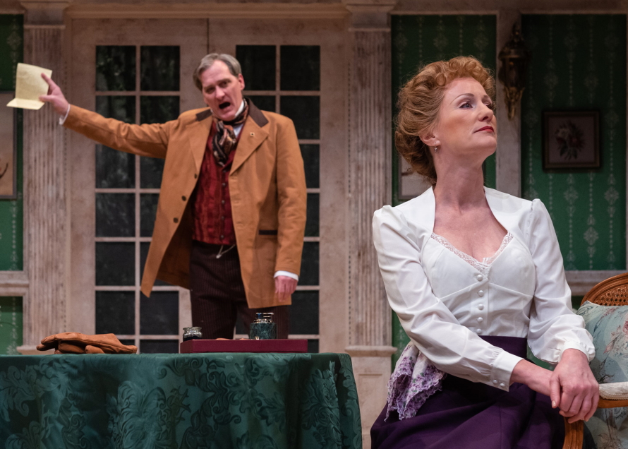 Aaron Lamb and Candace Vance in A Woman of No Importance at Taproot Theatre Company.
