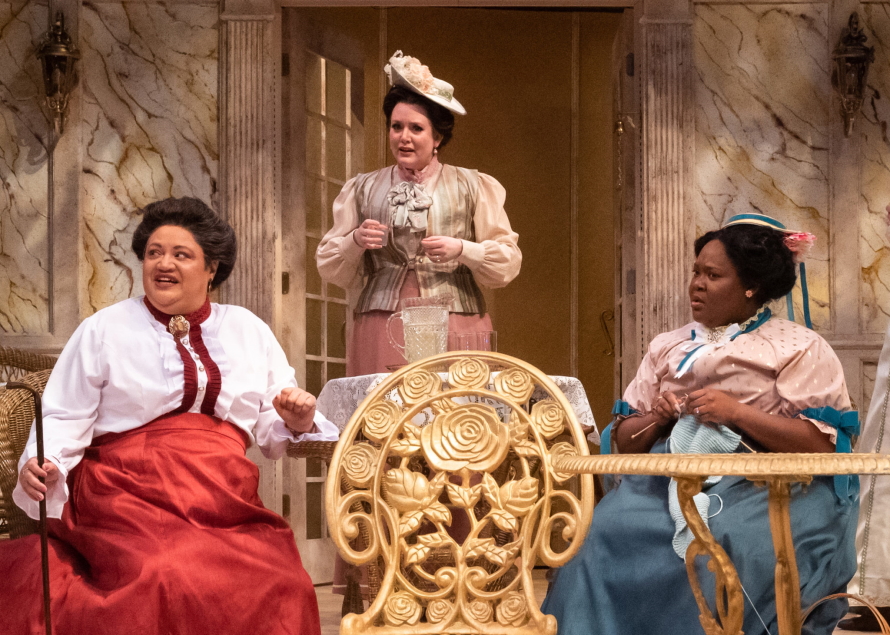 Rebecca M. Davis, Melanie Hampton, and Bretteney Beverly in A Woman of No Importance at Taproot Theatre Company.