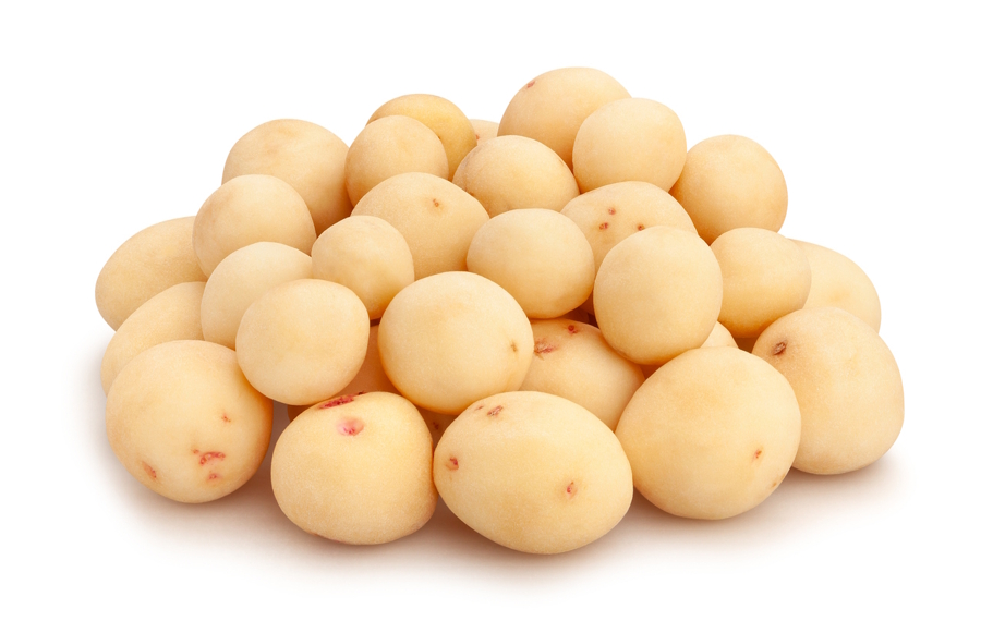a pile of small white potatoes on a plate