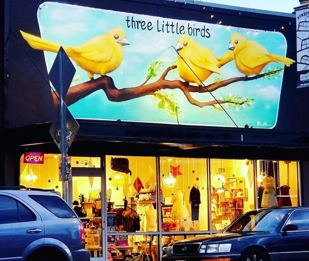 View of the front of Three Little Birds consignment shop in Burien, near Seattle