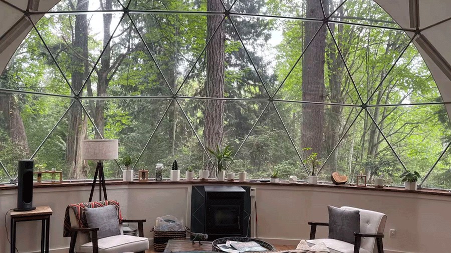 interior view of geodesic dome with large windows, a unique rental for seattle families