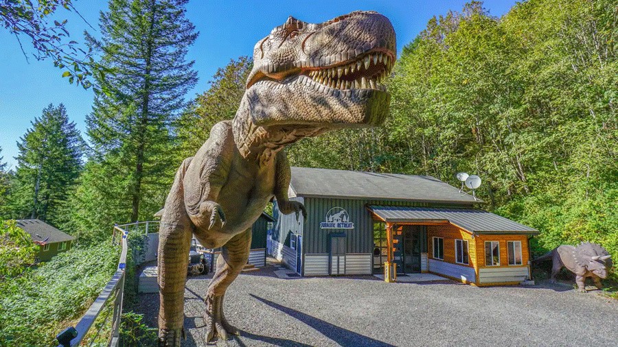 Large T. Rex statue outside a Seattle vacation rental