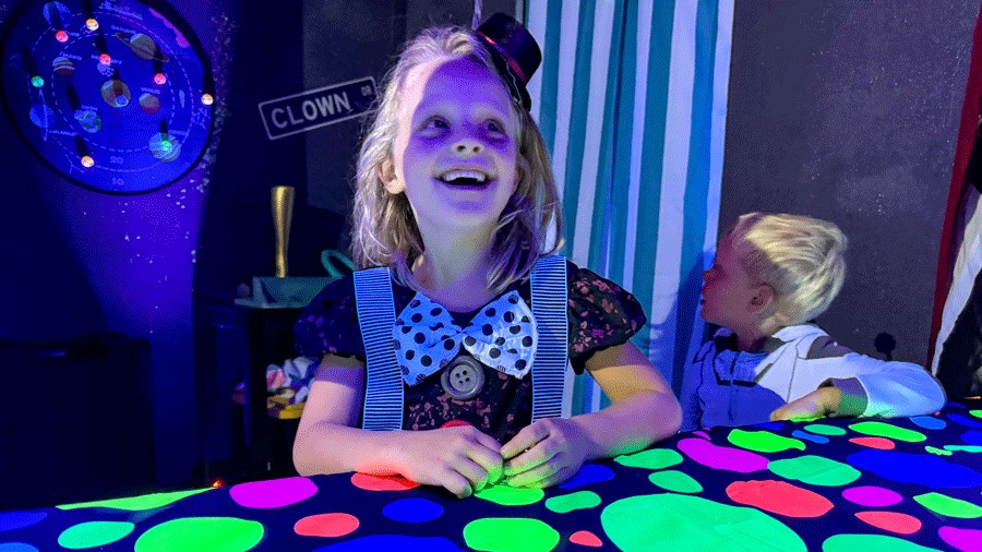 Young girl in Halloween costume at Cosmic Carnival, a Seattle activity for families