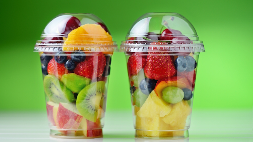 fruit with a plastic lid on top is a healthy team snack idea for summer