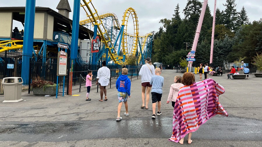 Families walking around Wild Waves theme park