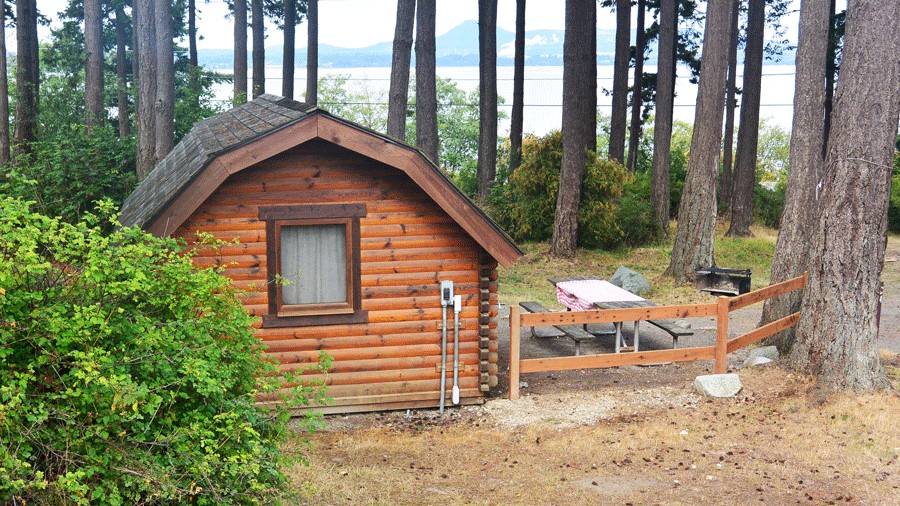 exterior of Bay View State Park cabin with water views, a cabin rental for Seattle-area families