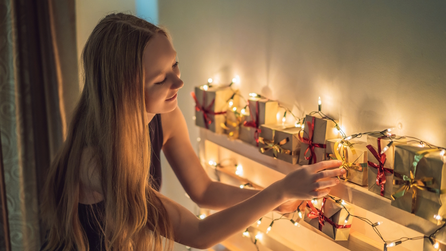 Teen with advent calendar
