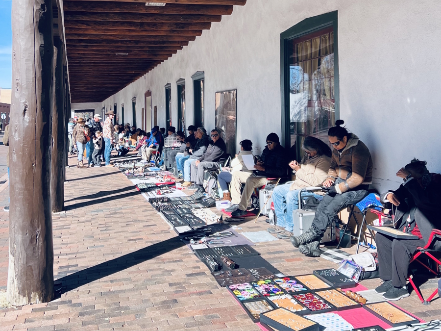 artists in a market in Santa Fe