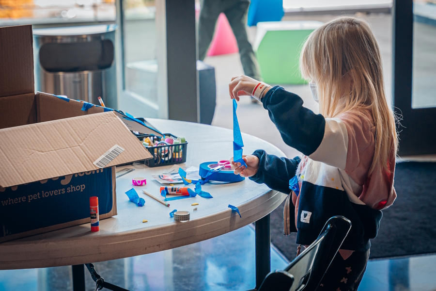 Little girl getting creative at  LeMay – America’s Car Museum