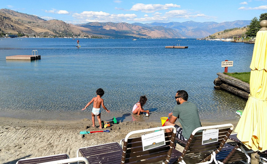 Campbell’s Resort kids on the beach at lake chelan