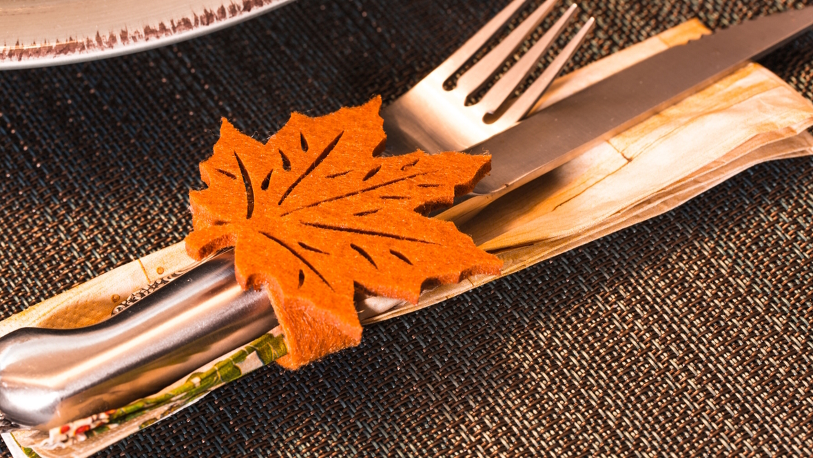silverware with a leaf napkin ring