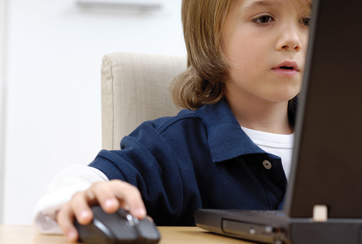 Kid on computer