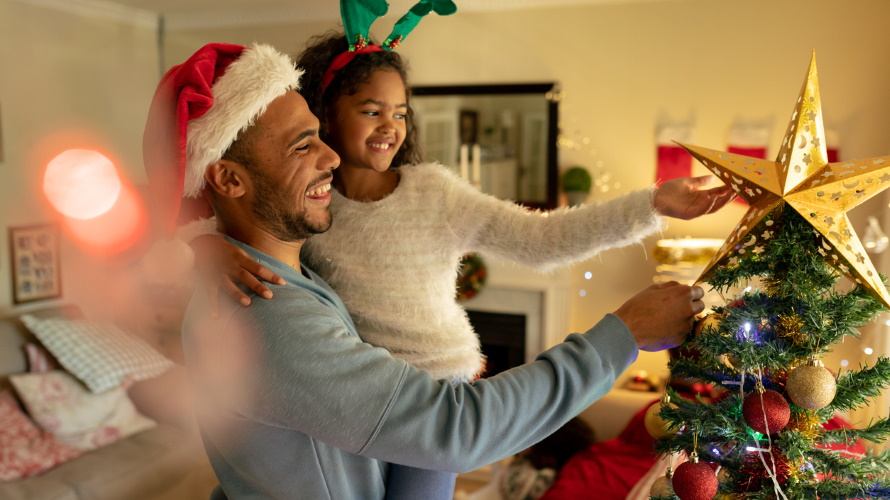 Dad-and-kid-decorating-the-tree
