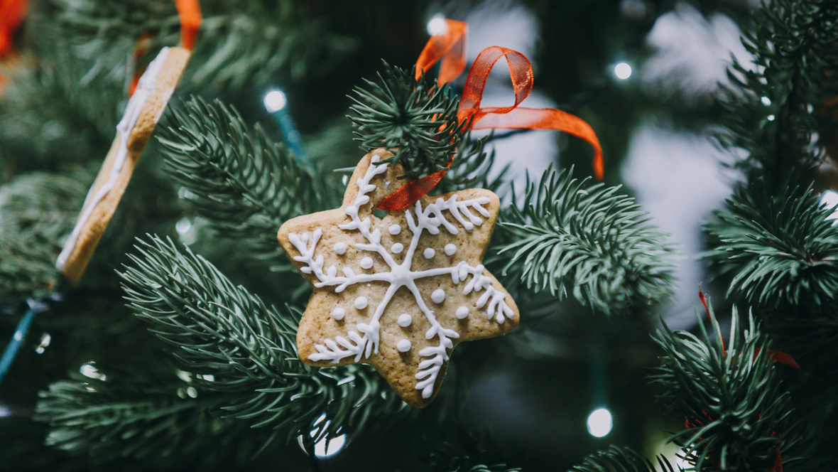 gingerbread ornament hanging on a tree
