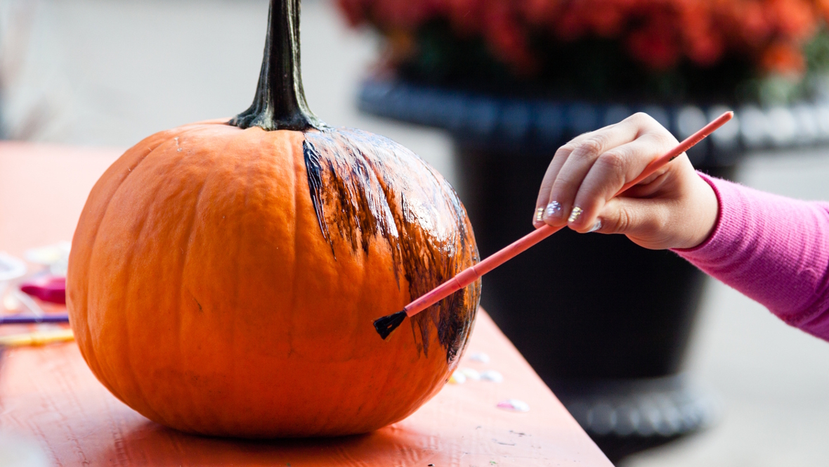 painting a pumpkin black
