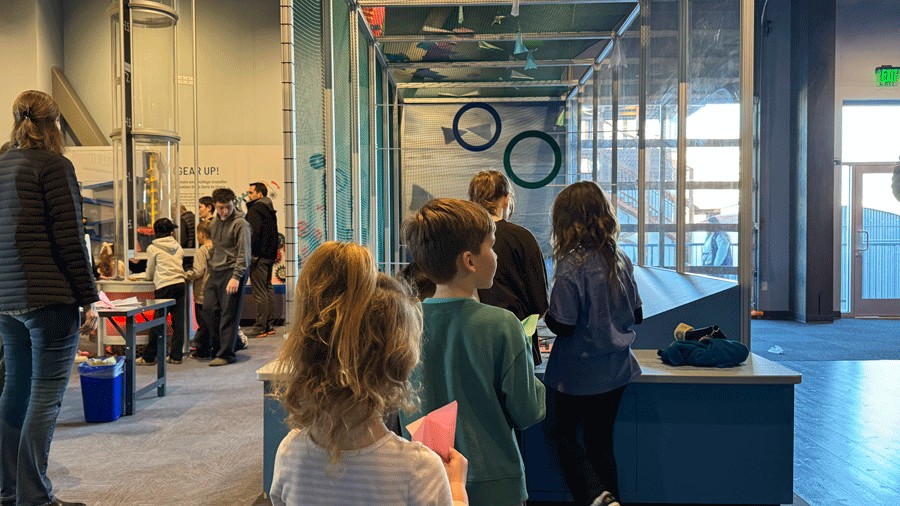 kids waiting to test their airplane designs at the new Ready... Set... Launch exhibit