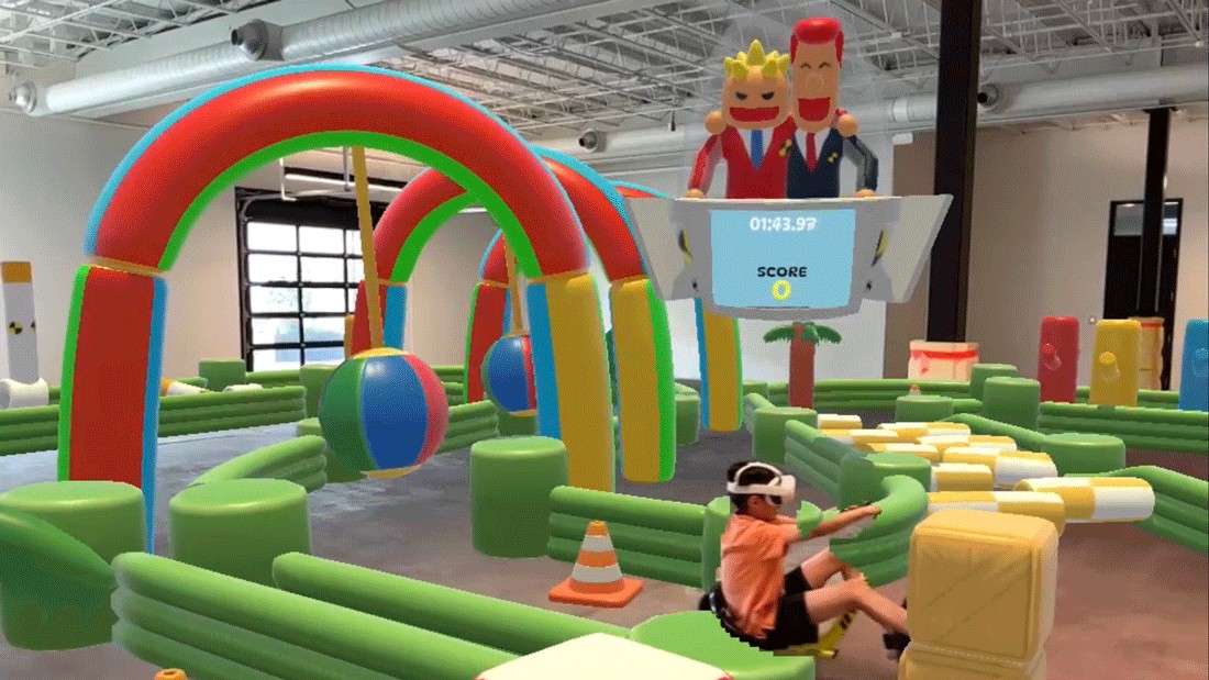 young boy wearing VR headseat at DreamPark Seattle playing an immersive video game