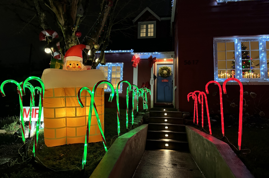 Santa in a chimney and candy canes on candy cane lane