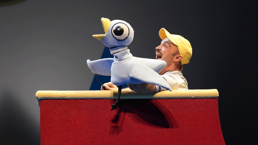 Noah Duffy with the pigeon puppet in SCT's new holiday show