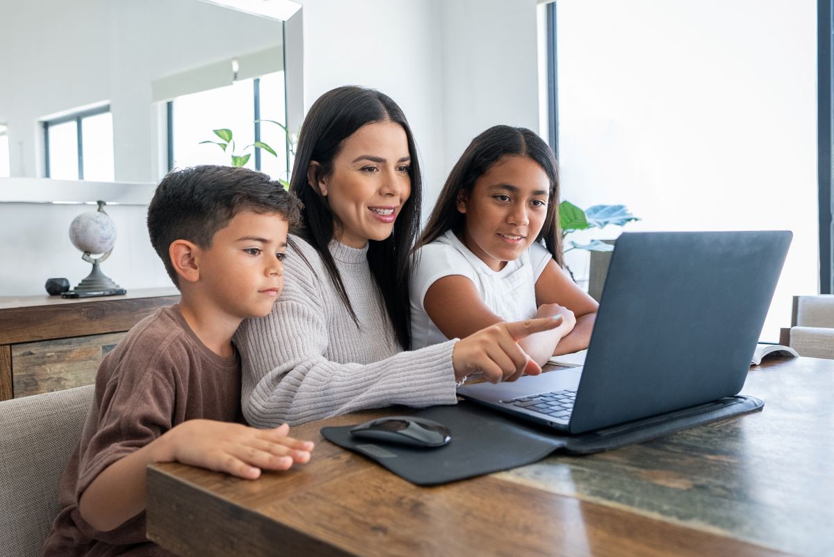 family setting up digital privacy on their home computer