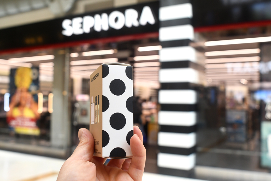 small sample size product help up outside Sephora store