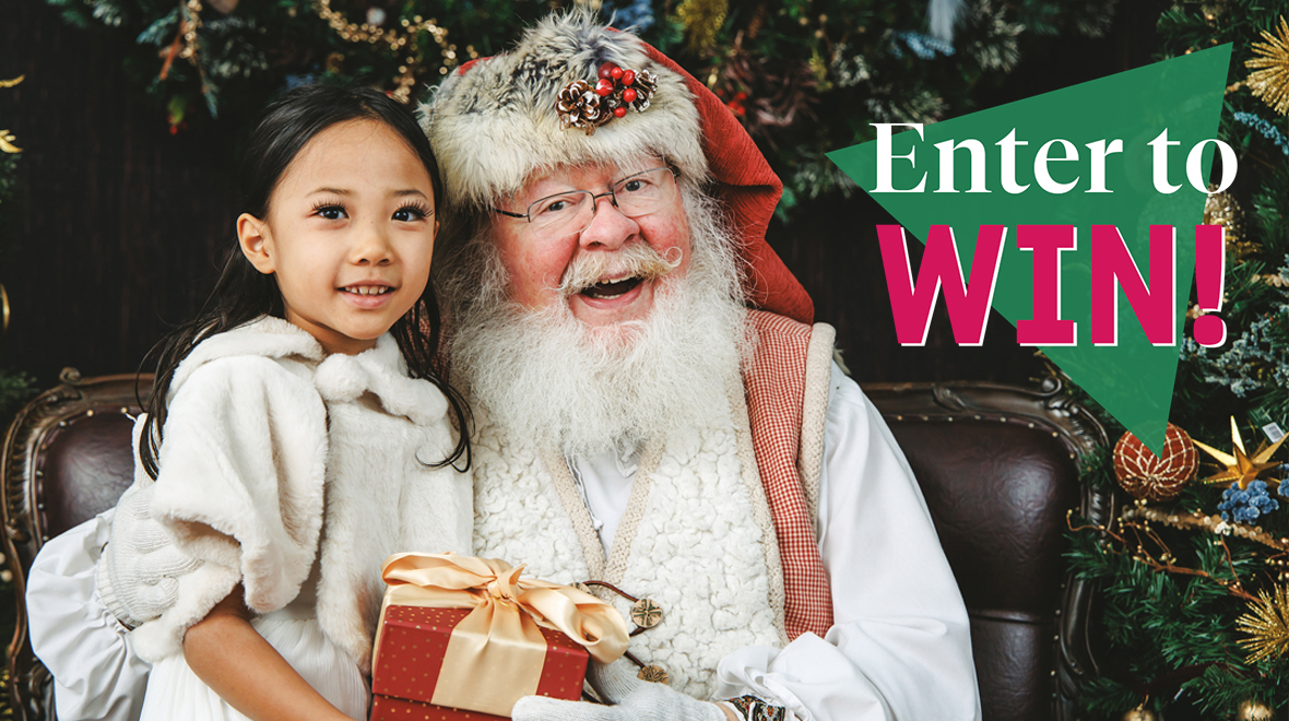 Enter to Win! Text over girl taking photo with Santa