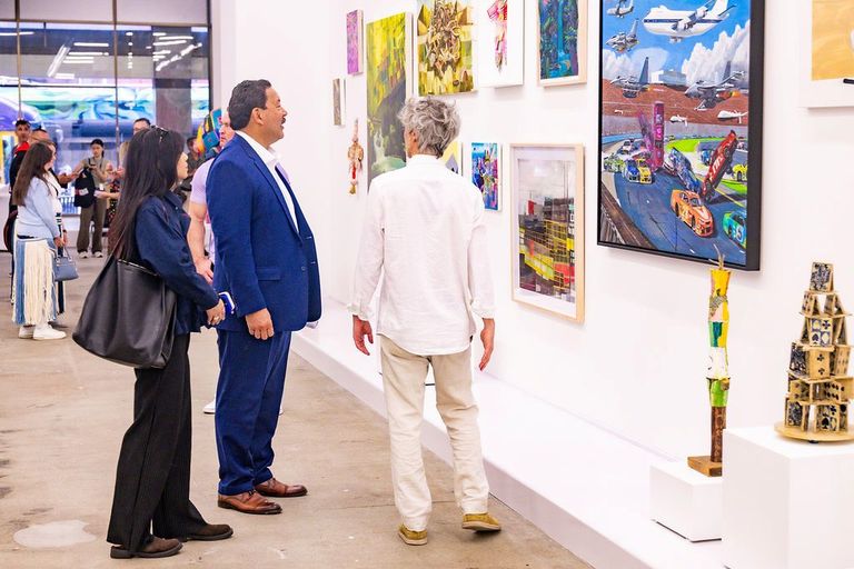 Seattle Area Family Museums Change Things Up Seattle Mayor Bruce Harrell And New Rising Sun Ceo Joe Paganelli Viewing Exhibits Inside Of Cannonball Arts Credit Jim Bennett Photo Bakery For Cannonball Arts 768x512 