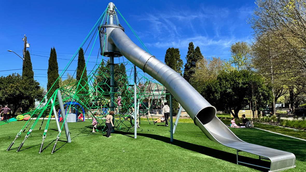 kids playing on the climbing structure at South Park's new playground in Seattle