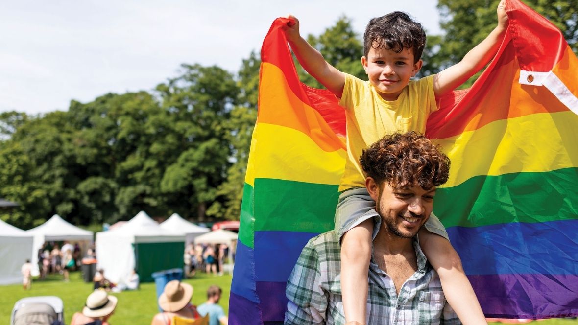 little boy at pride festival