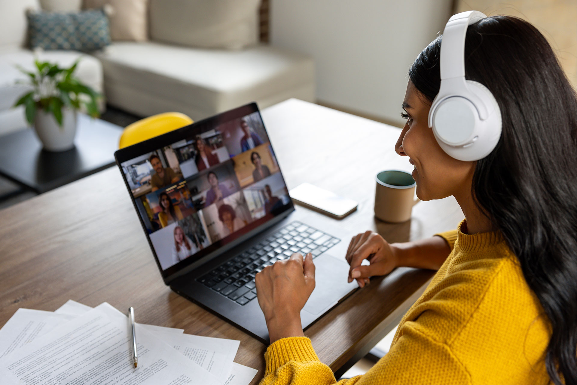 Woman working at home on a webinar meeting