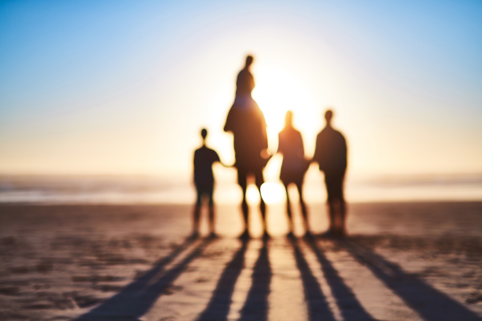 picture of family at the beach that is blurry