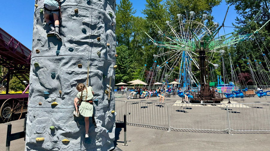 kids climbing the rock wall at Remlinger Farms Fun Park, a Seattle-area spot offering season passes