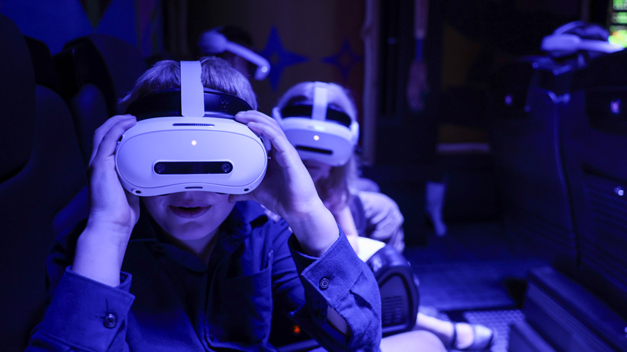 kids wearing VR headsets for Sasquatch Mountain on the Seattle Waterfront