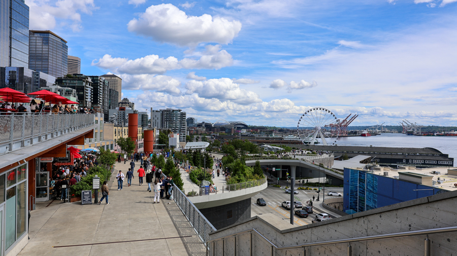 view of old stove brewing co. and great wheel from overlook walk on the seattle waterfront