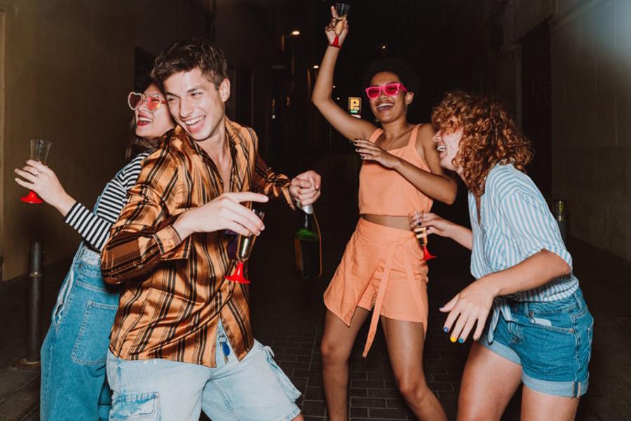 Teenagers drinking at a party