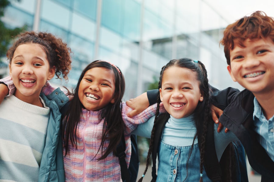 group of middle school kids smiling