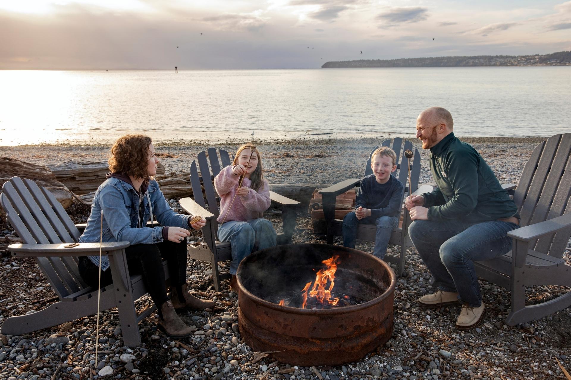 family roasting smores by the beach at semiahmoo resort