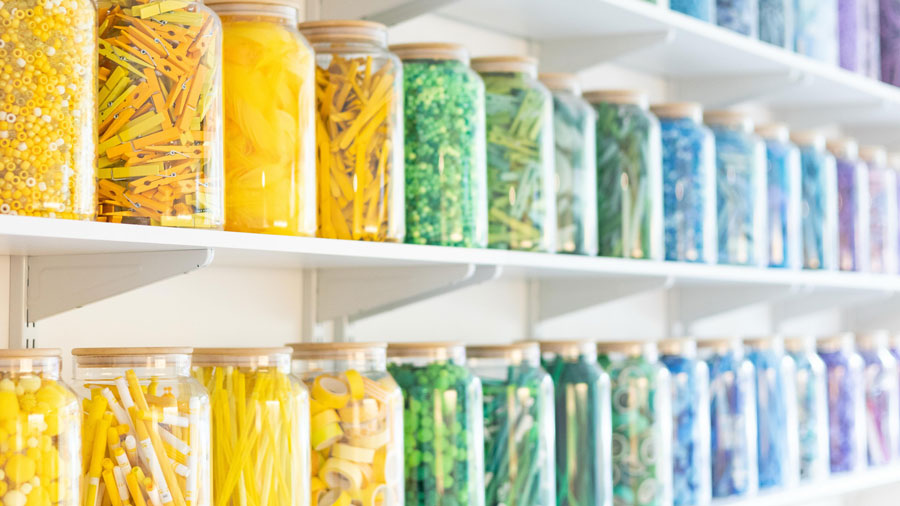 a rainbow wall of craft supplies at Pure Art Co., a Seattle art studio